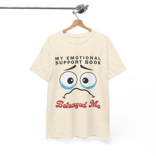 Beige t-shirt with sad cartoon face and text 'My Emotional Support Book Betrayed Me'