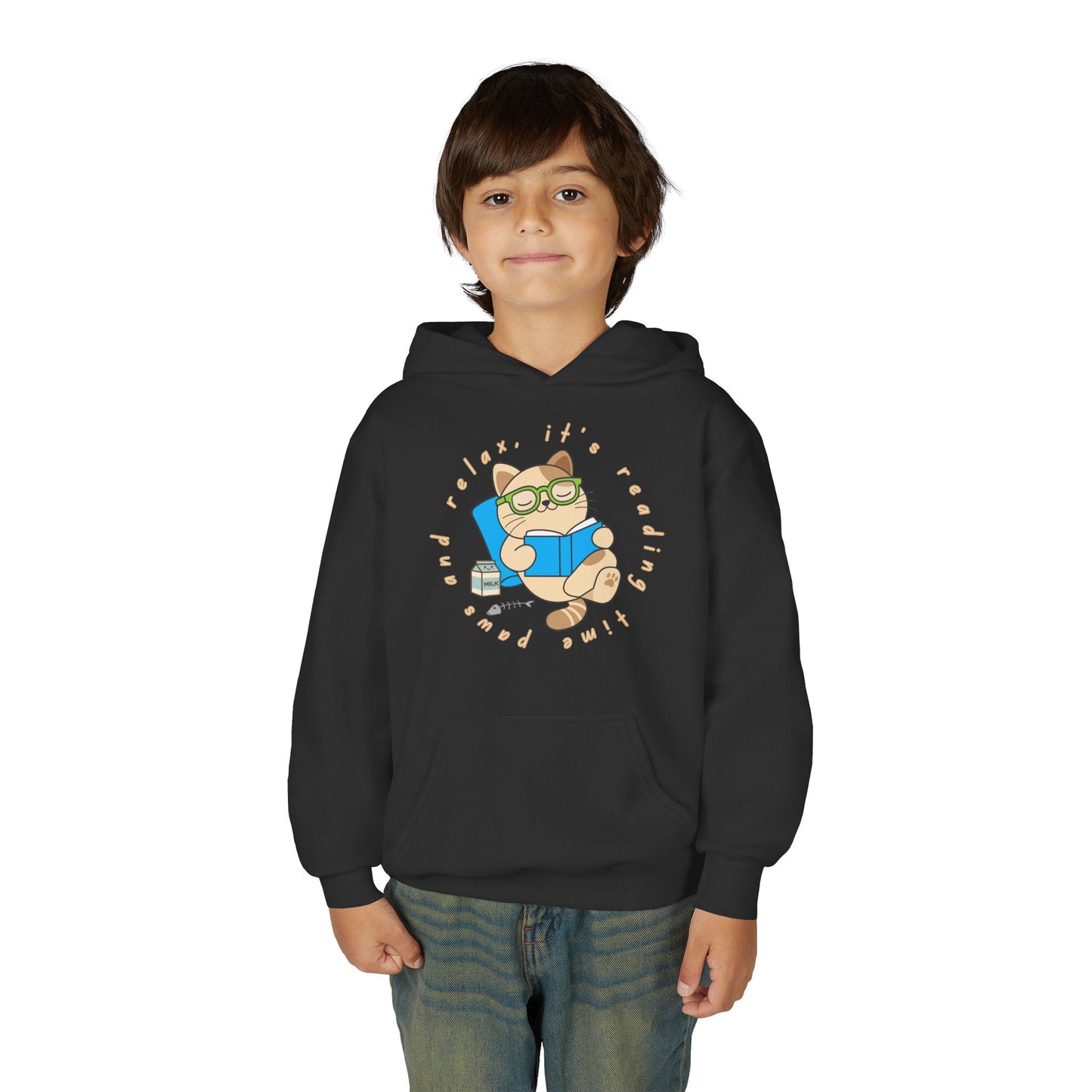 Boy wearing a black hoodie with a graphic of a cat reading a book and text 'Paws And Relax, It's Reading Time'