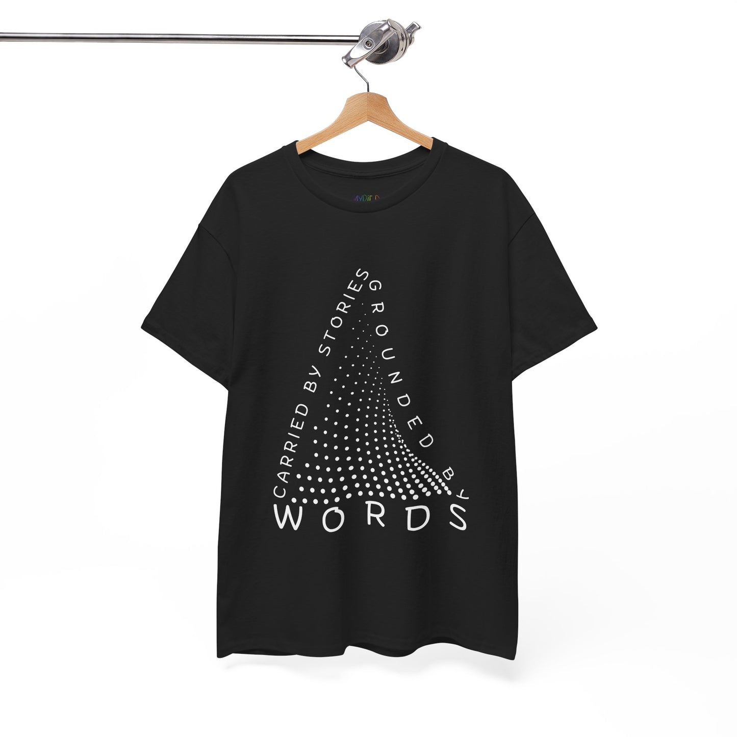 Black t-shirt with white text that follow the outline of a dotted triangle 'Carried By Stories, Grounded By Words' 