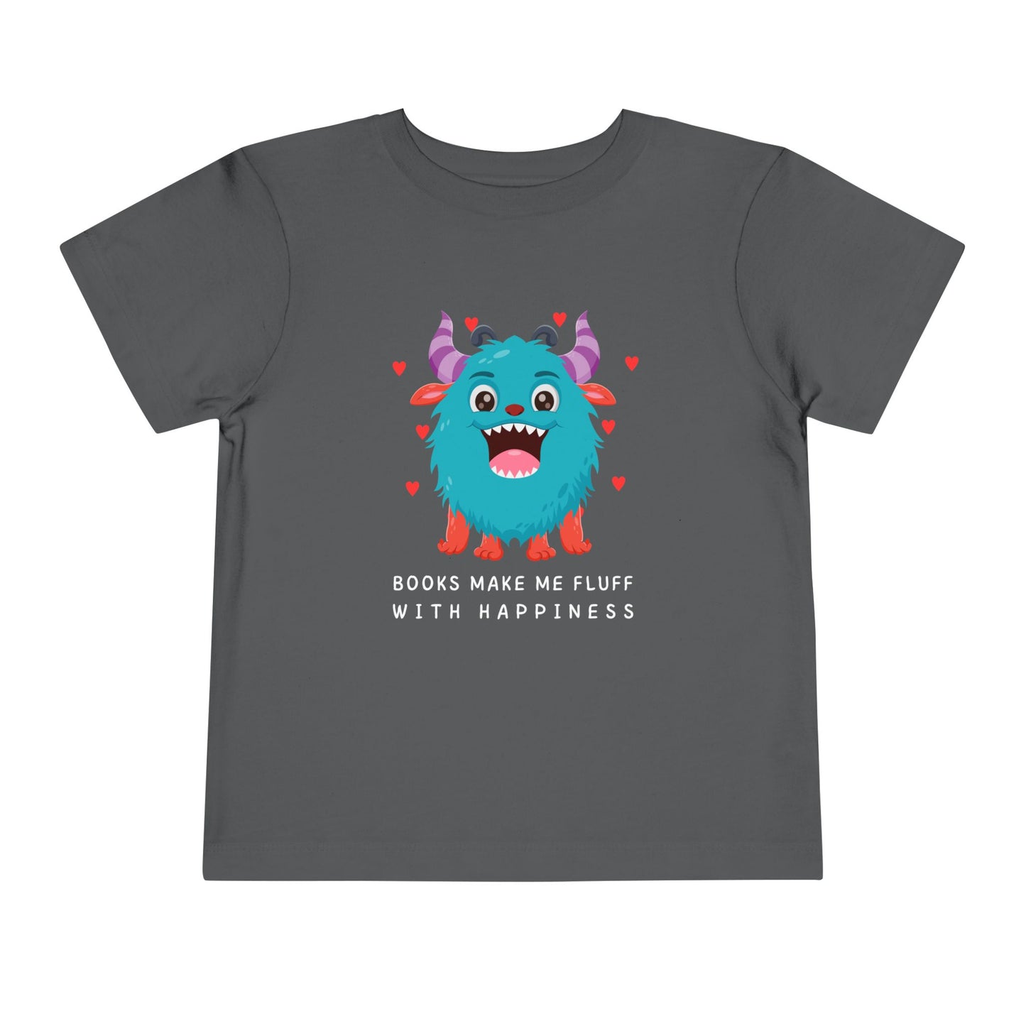 Gray toddler t-shirt with a fluffy blue monster graphic, floating hearts and text 'Books Make Me Fluff With Happiness' on a white background