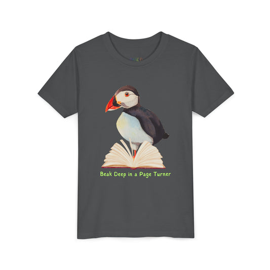 Dark gray t-shirt with a puffin, open book and text 'Beak Deep in a Page Turn' 