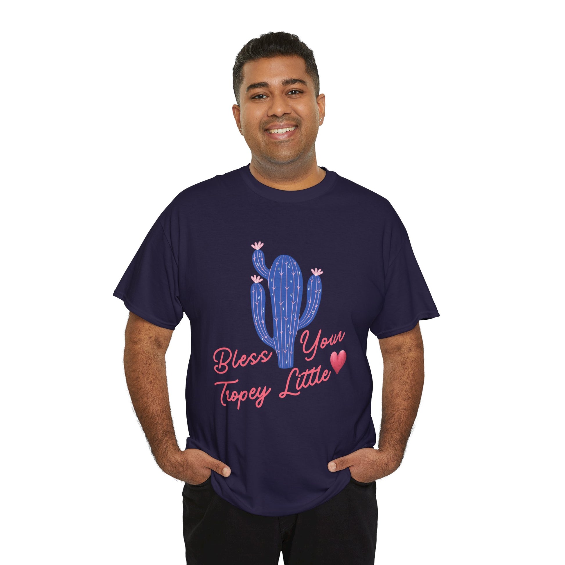 Man wearing a dark blue t-shirt with a pink and blue cactus and text 'Bless Your Tropey Little' and then a picture of a heart