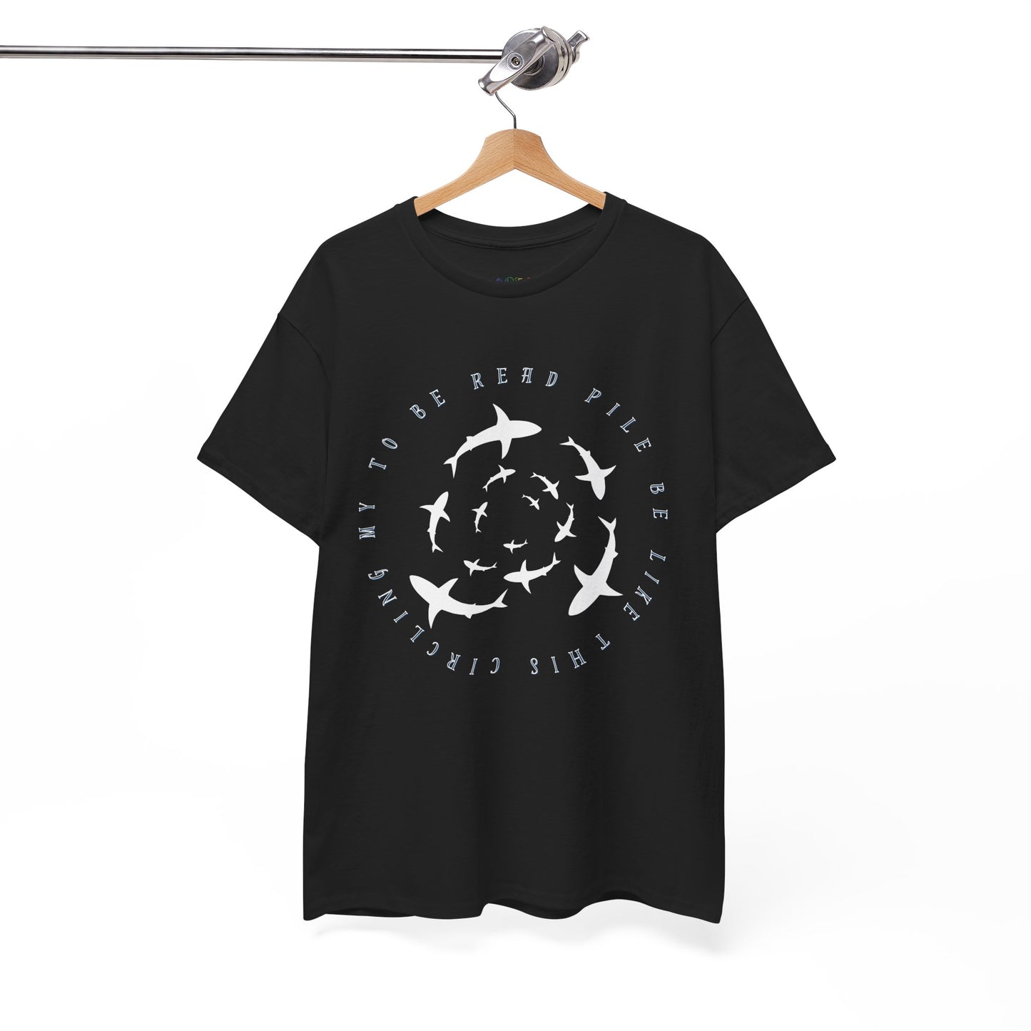 Black t-shirt with white graphic sharks in various sizes circling and text 'circling my to be read pile be like this' 