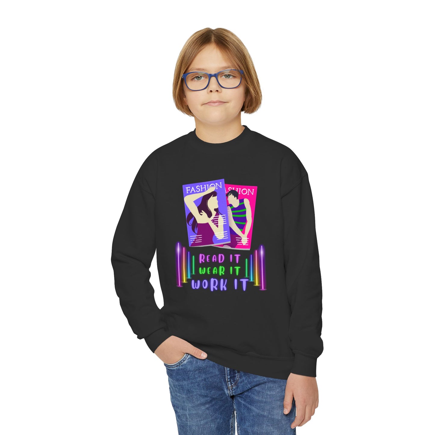 Boy wearing a black sweatshirt with colorful fashion magazine, neon lights and text 'Read It. Wear It. Work It.' 