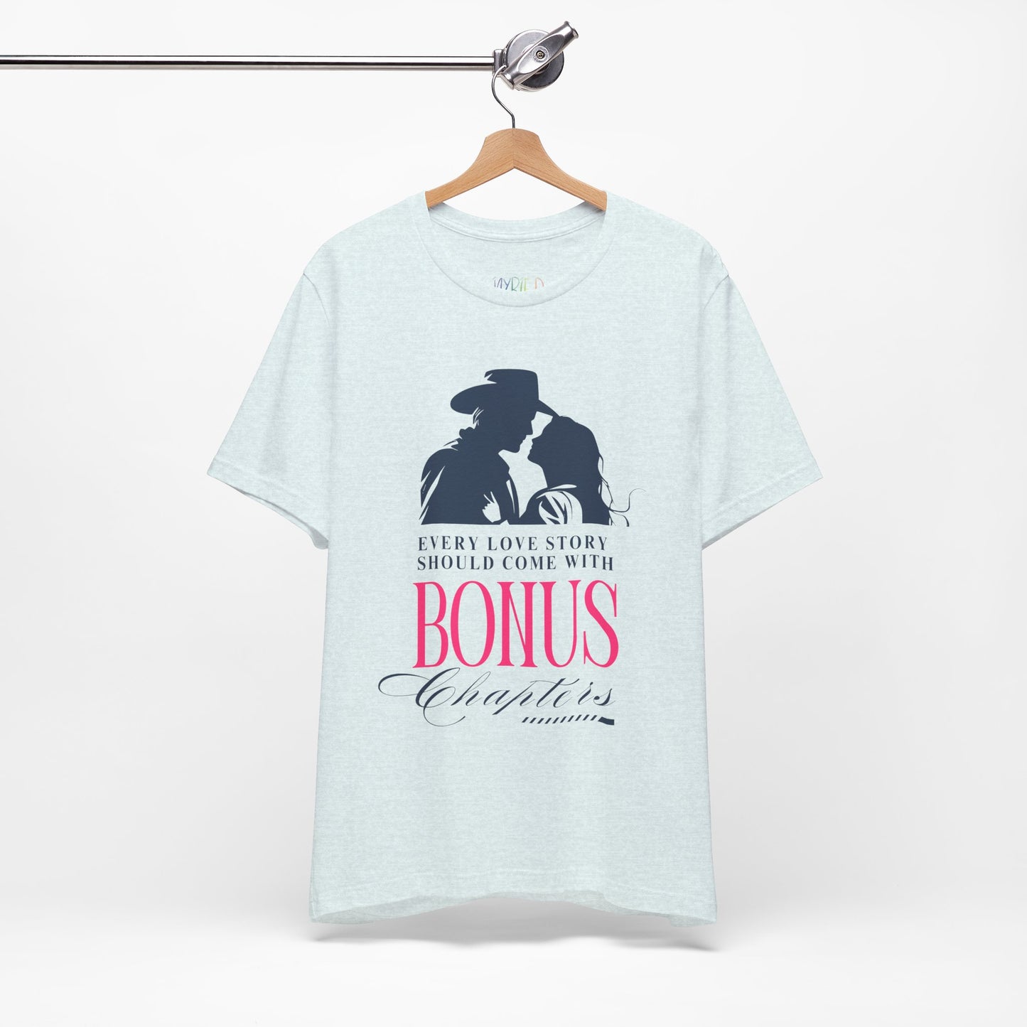 Icy blue t-shirt with western graphic of a man and woman leaning in for a kiss, text "Every Love Story Should Come With BONUS Chapters'