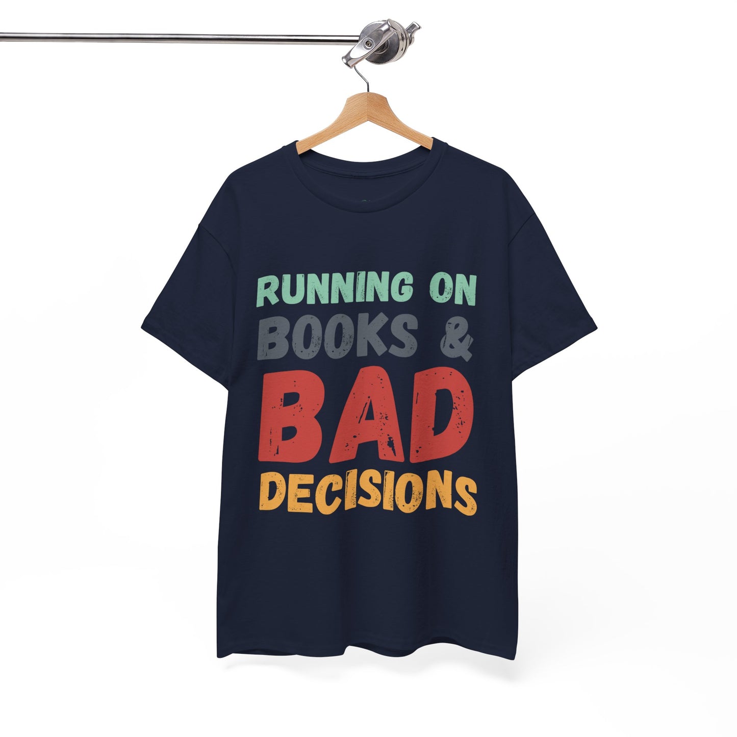 Navy t-shirt with colorful retro text 'Running on Books & Bad Decisions' 