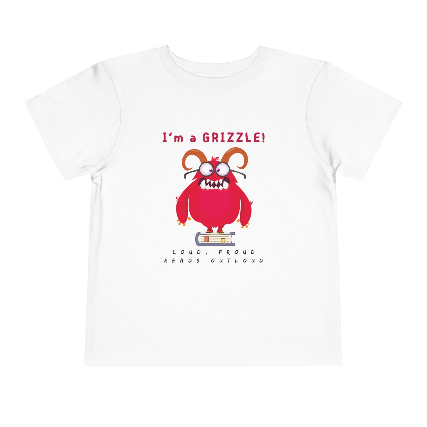 White toddler personality t-shirt with a red monster graphic standing on a book proudly proclaiming 'I'm a GRIZZLE!' Sub-text 'Loud, Proud, Reads Aloud.'