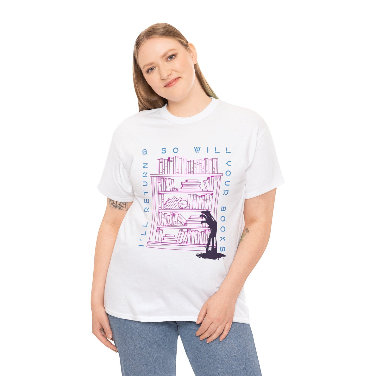 Woman wearing a white t-shirt with a graphic design of a zombie arm reaching for a book on a bookshelf and text 'I'll Return & So Will Your Books' on a hanger against a white background
