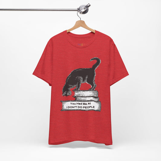 Red t-shirt with a graphic design of a cat on a stack of books and text 'You Had Me At I Don't Do People'