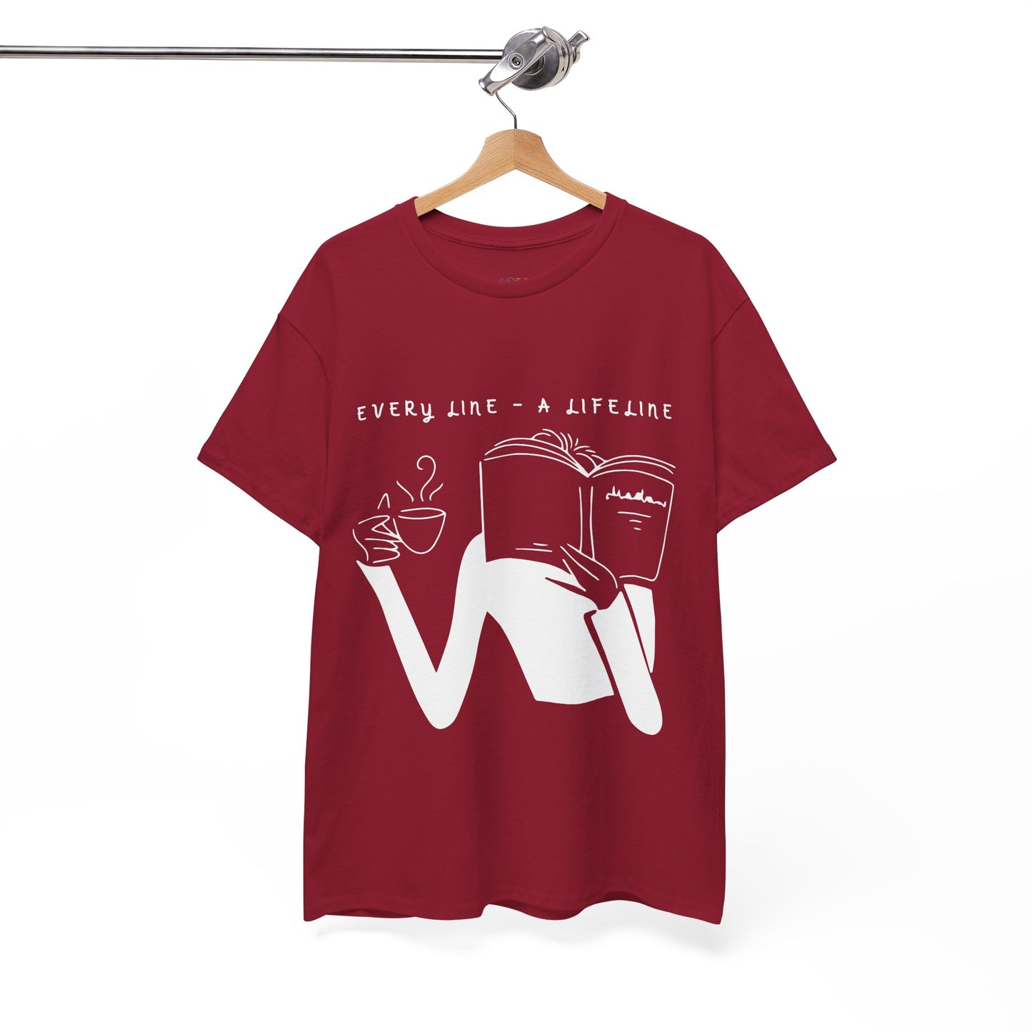 Maroon t-shirt with white graphics of someone holding up a hot beverage and a book as they read, text 'Every Line - A Lifeline' 