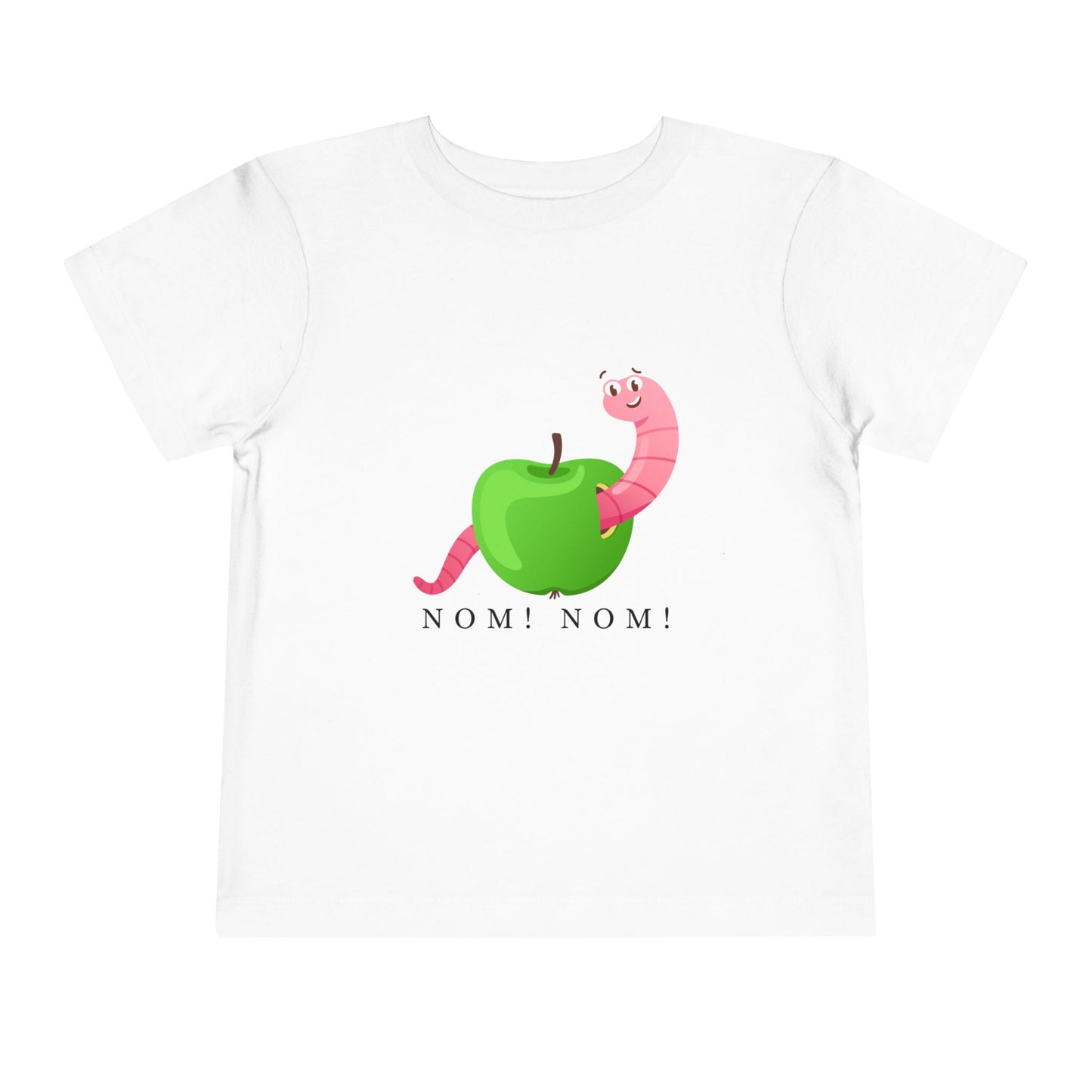 White toddler t-shirt with a green apple and pink worm graphic and 'NOM! NOM!' text 