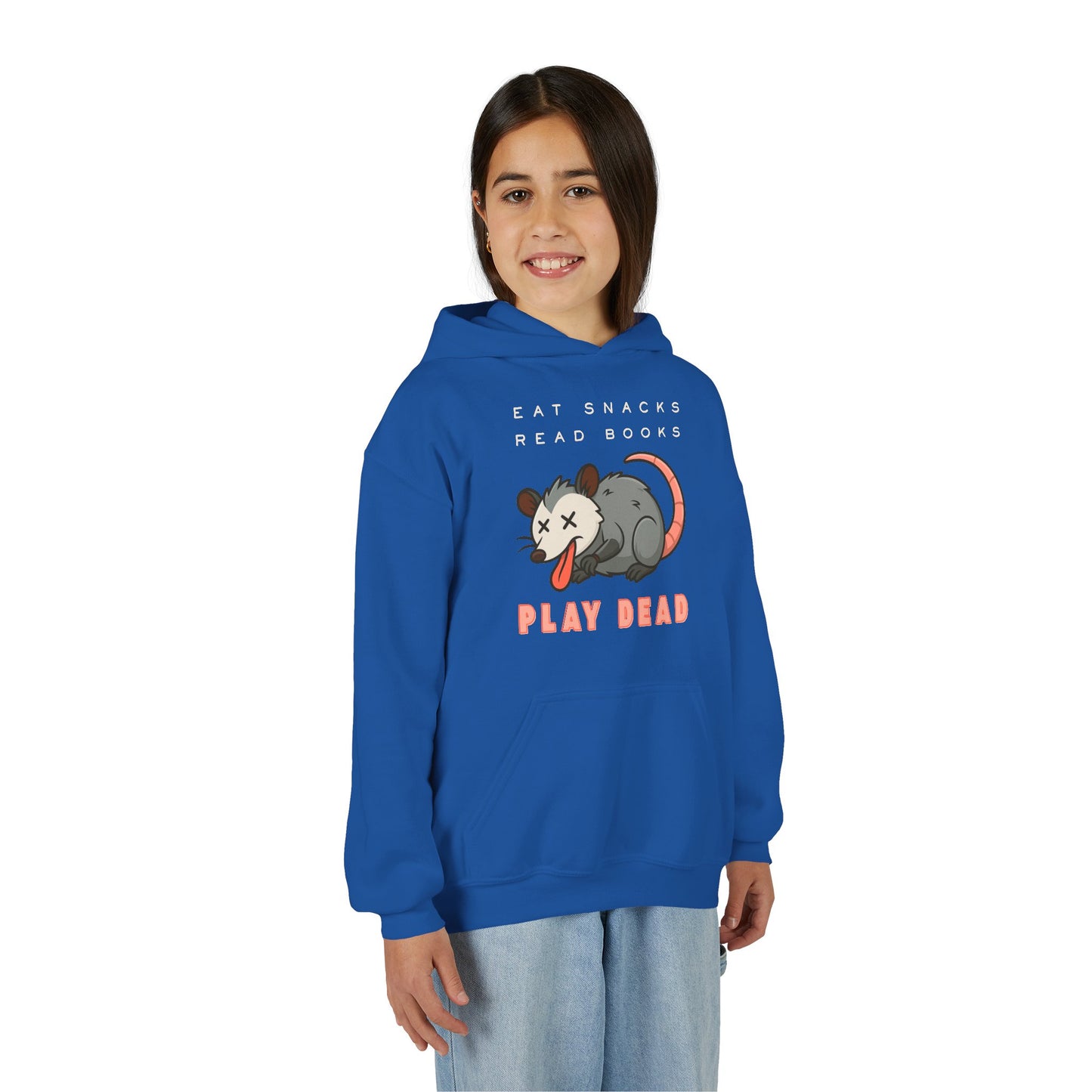 Girl wearing a blue hoodie with a graphic of a opossum and text 'Eat Snacks. Read Books. Play Dead'