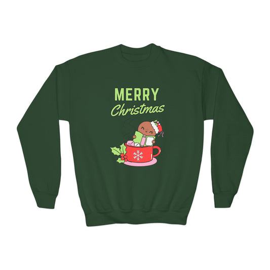 Green sweatshirt with a gingerbread man reading in a book, as he sits inside a cup of cocoa and text 'Merry Christmas' 