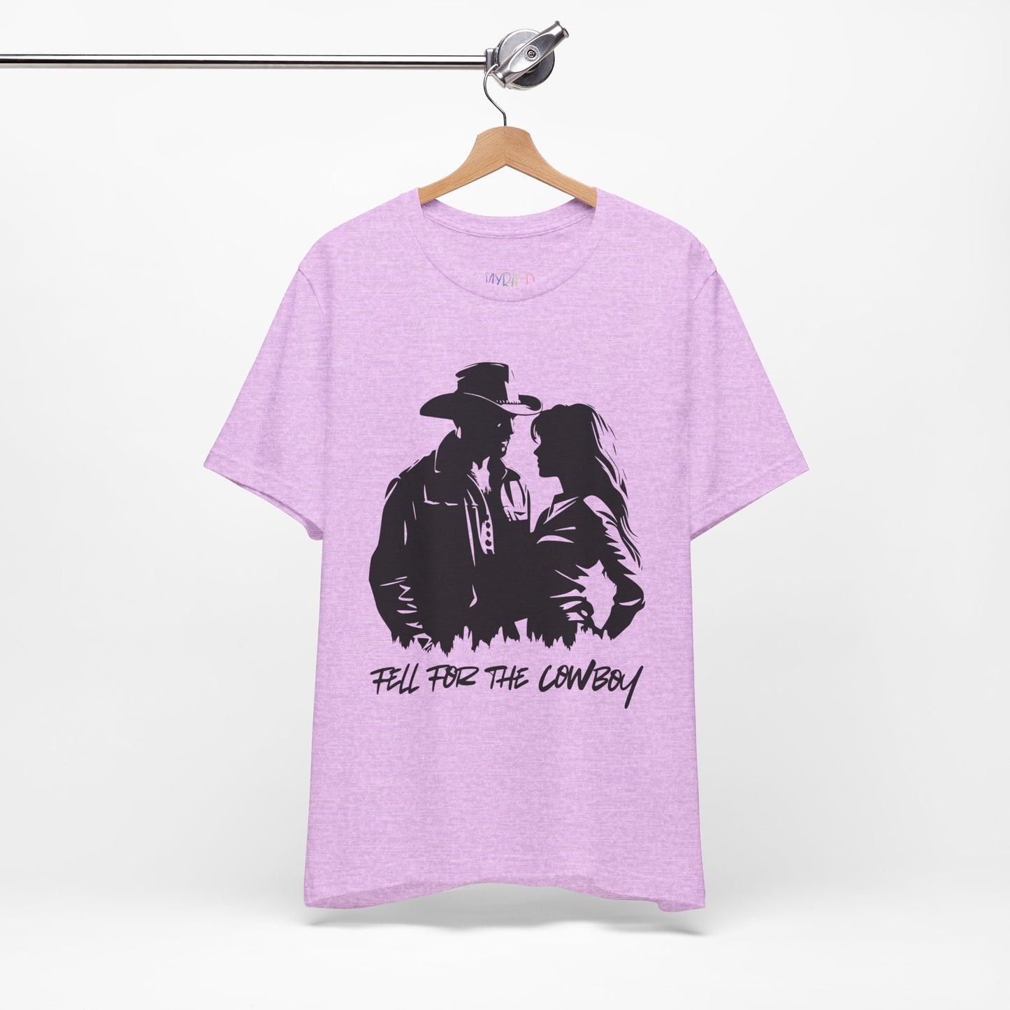 Light purple t-shirt with black graphic of a man and a woman, text says 'Fell for the Cowboy'
