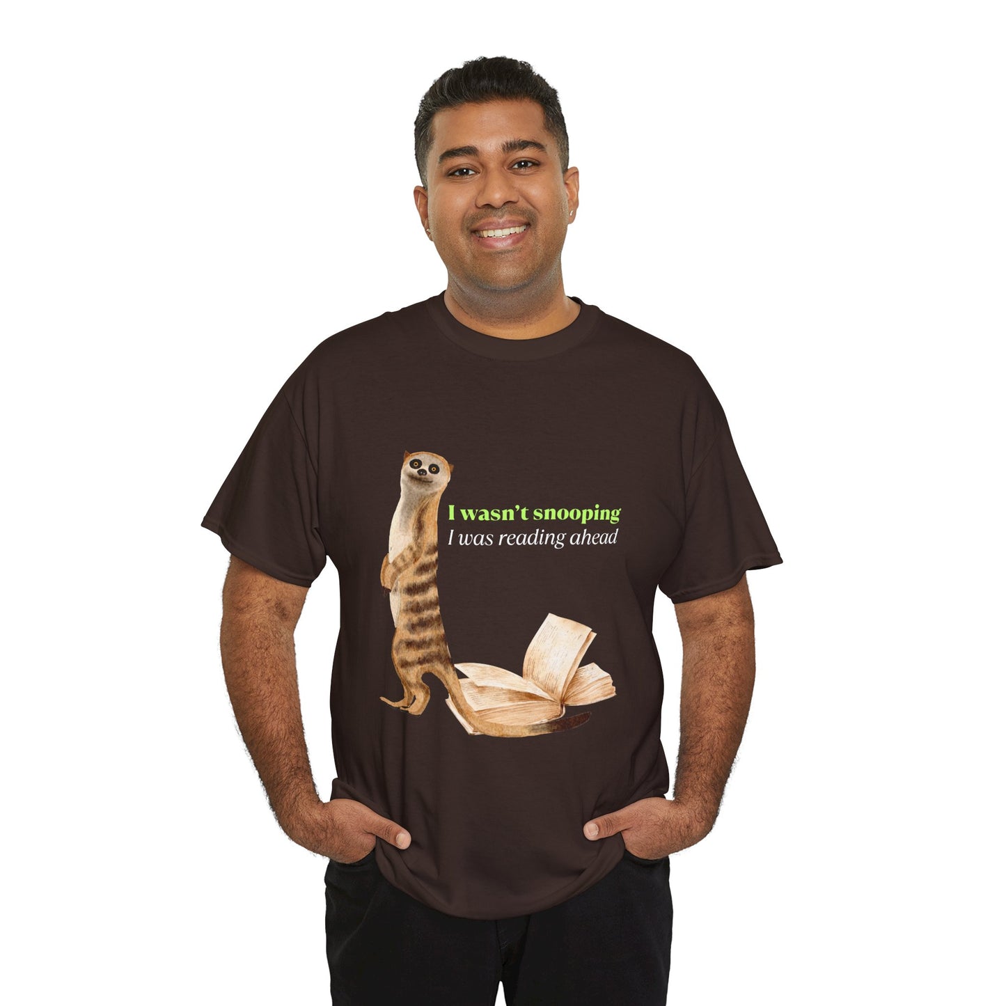 Man wearing a brown t-shirt with a sheepish meerkat, back to an open book, text 'I Wasn't Snooping, I Was Reading Ahead'