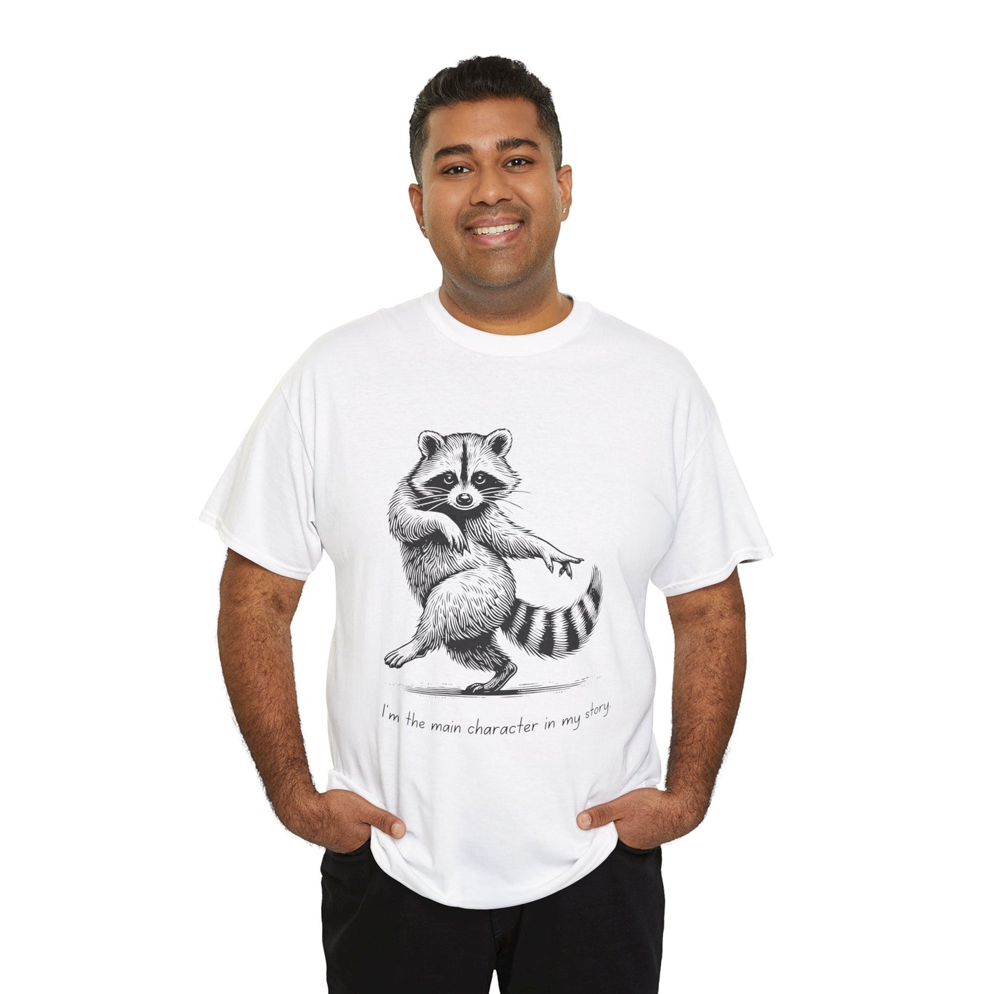 Man wearing a white t-shirt with a dancing raccoon graphic and text 'I'm the main character in my story'