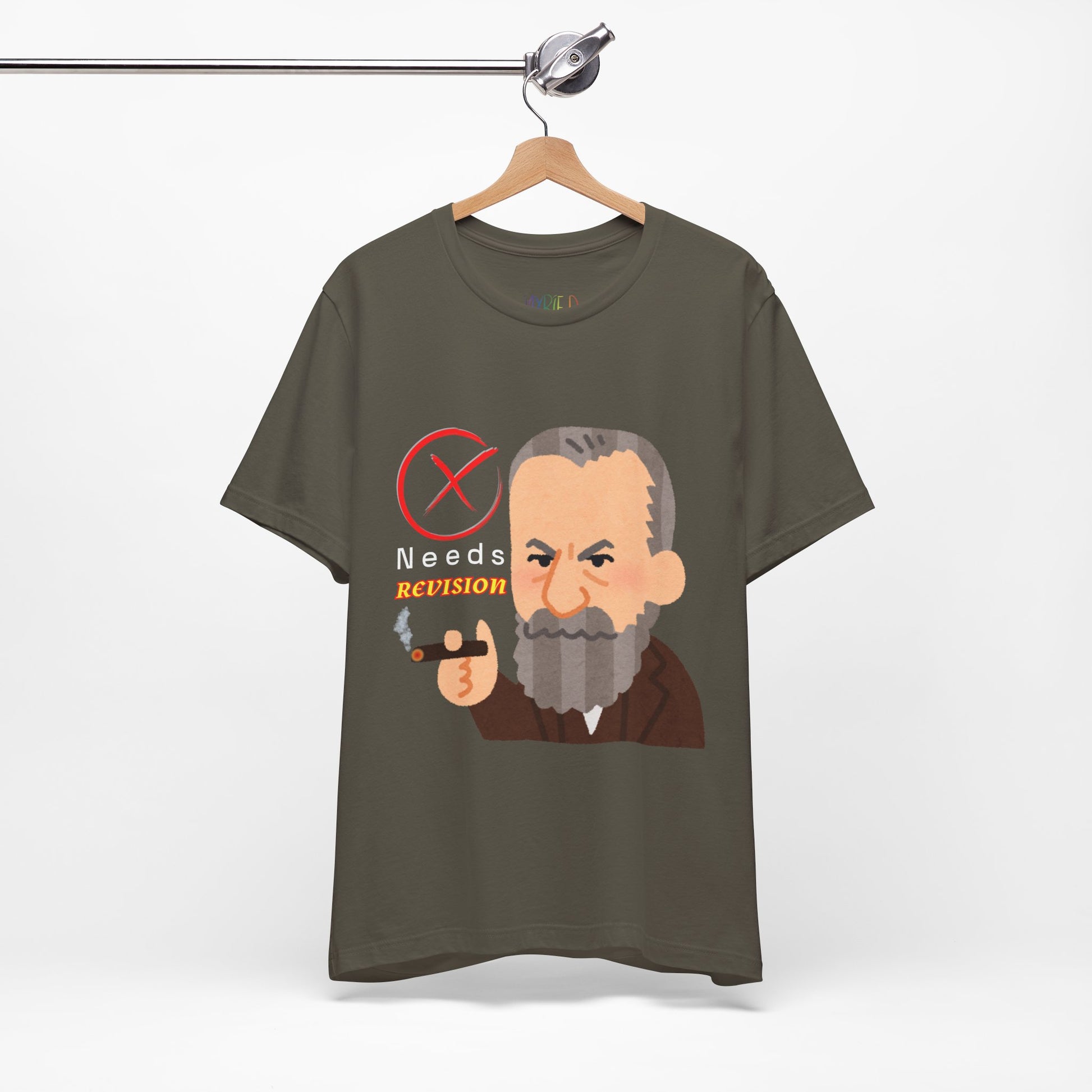 Army green t-shirt with a graphic design of a grumpy man smoking a cigar, a big red 'X' and text 'Needs Revision' 