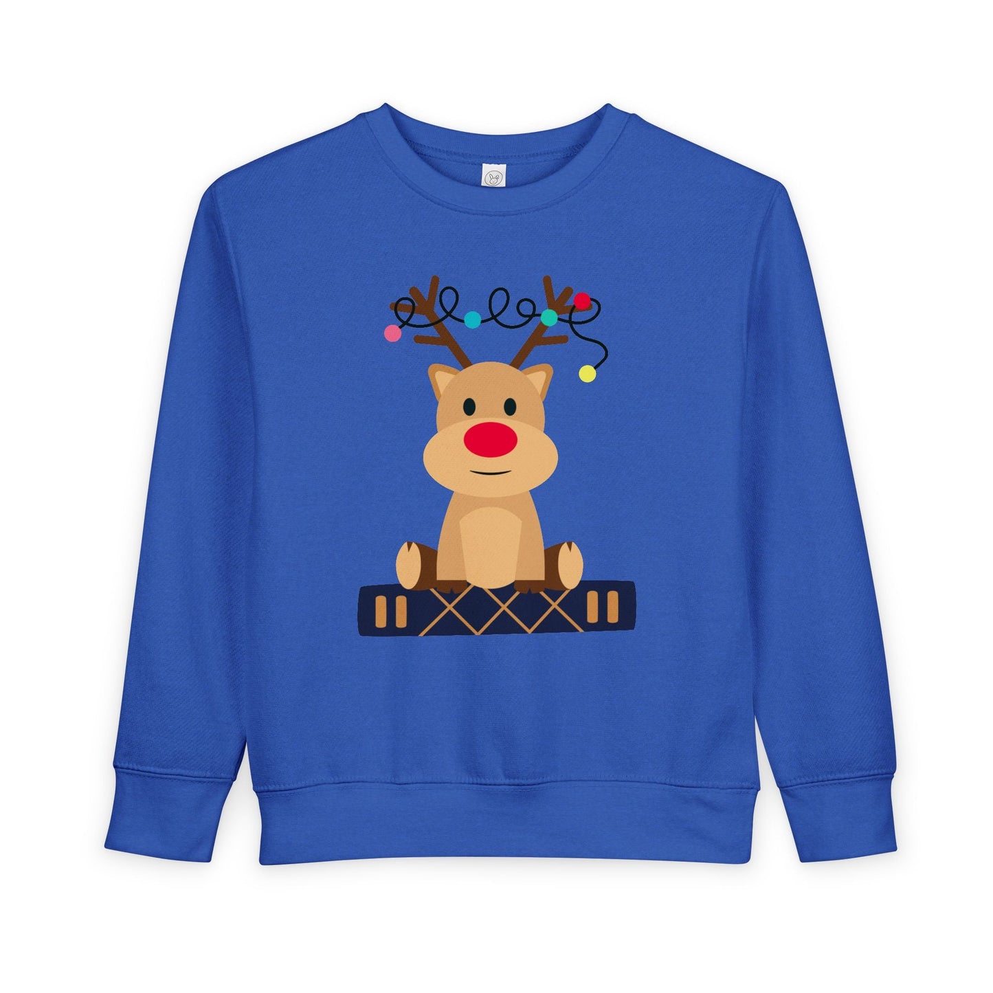 Blue toddler sweatshirt with a reindeer sitting on a book against a white background