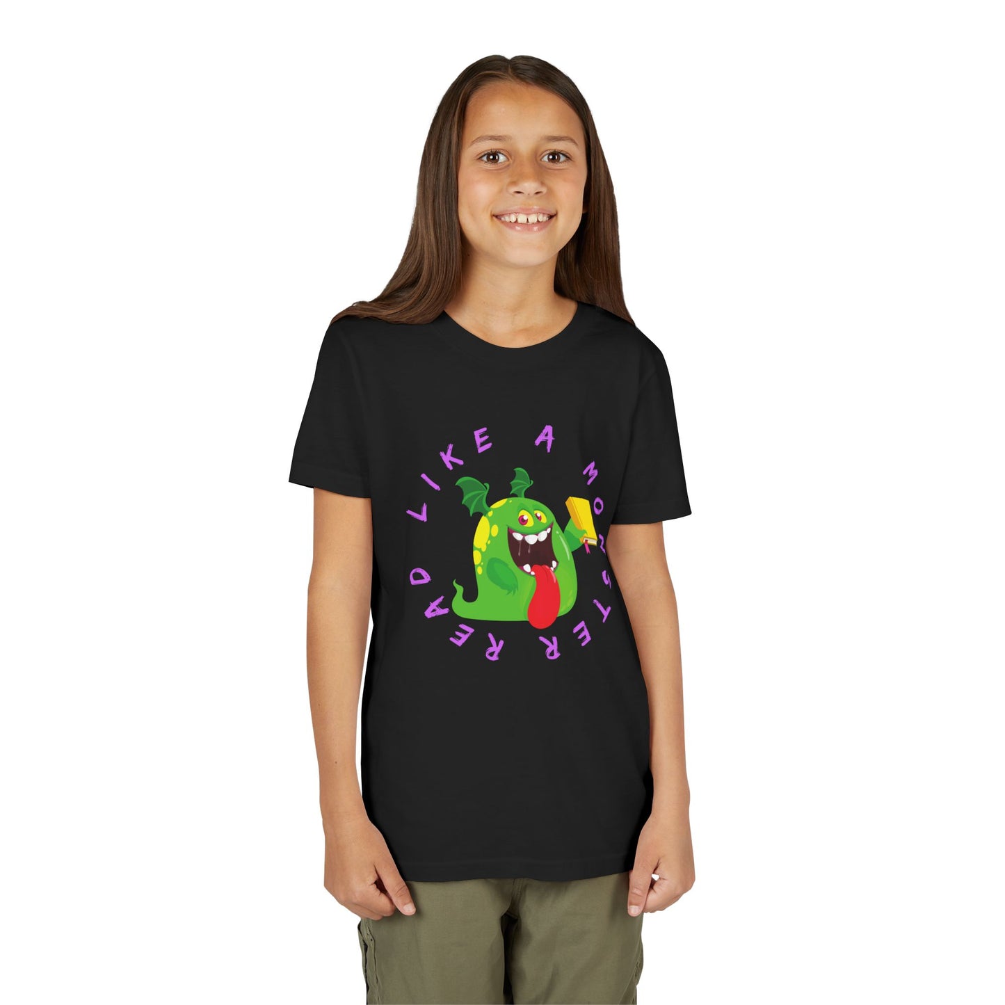 Girl wearing a black t-shirt with a wide mouthed green monster holding a yellow book, circled by purple text 'Read Like A Monster' 