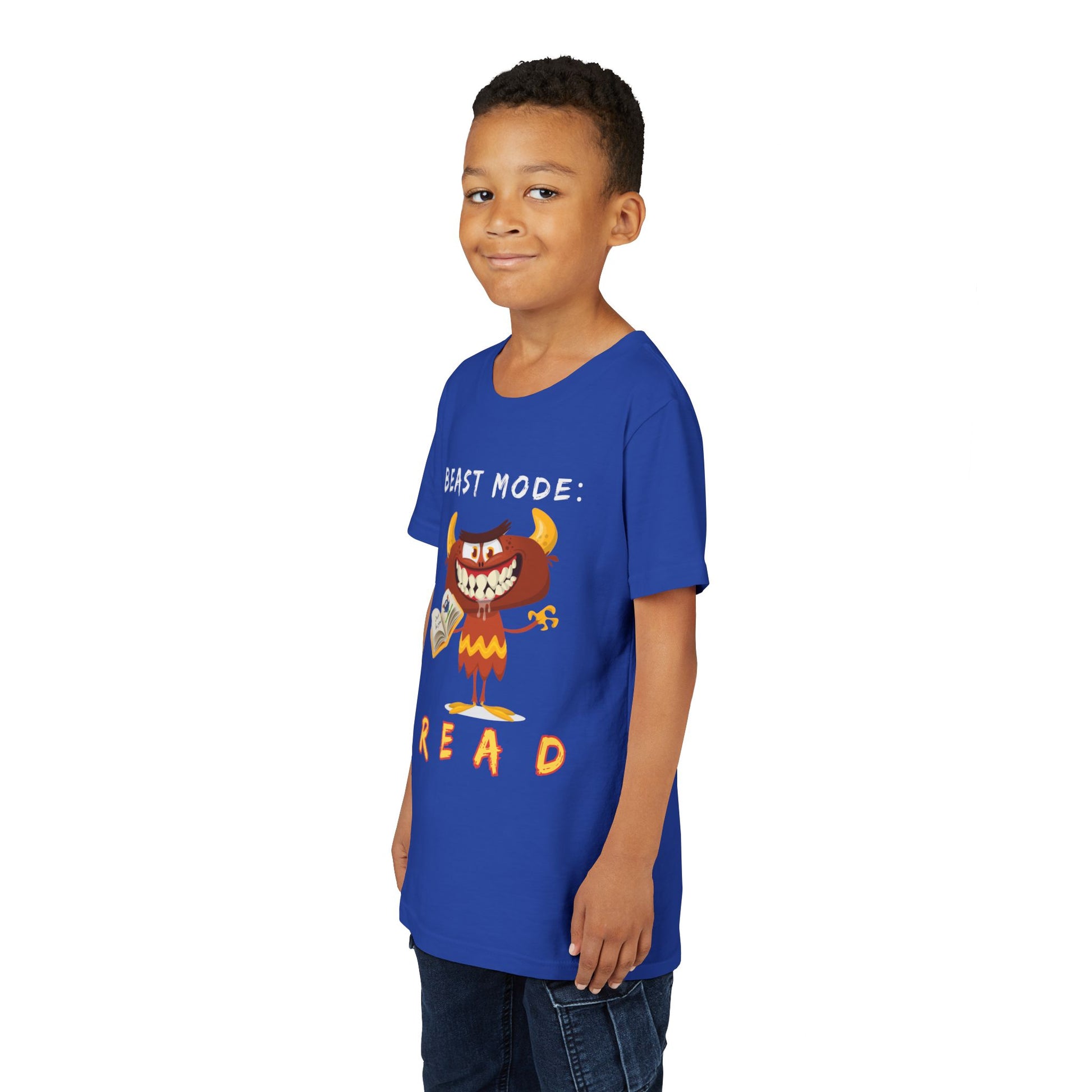 Boy wearing a blue t-shirt with a toothy, drooling, cartoon monster holding an open book and 'BEAST MODE: READ' text