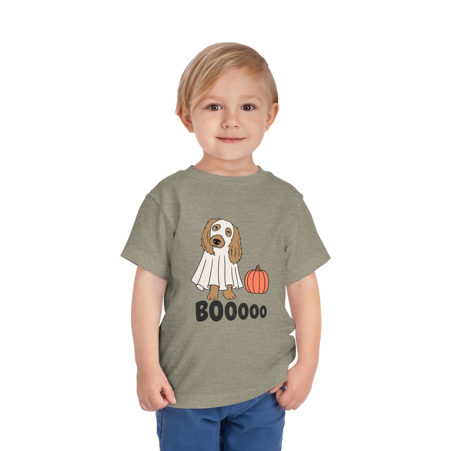 Child wearing a brown/gray toddler t-shirt with a dog in a ghost costume, a pumpkin and text 'Booooo' 