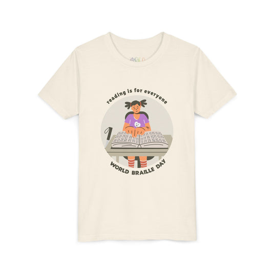 Beige t-shirt with a graphic of a girl reading a braille book and text 'Reading is for everyone. World Braille Day'.