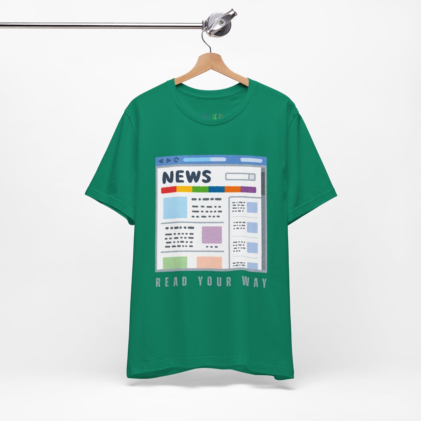 Green t-shirt with a graphic of a news website and text 'Read Your Way' 