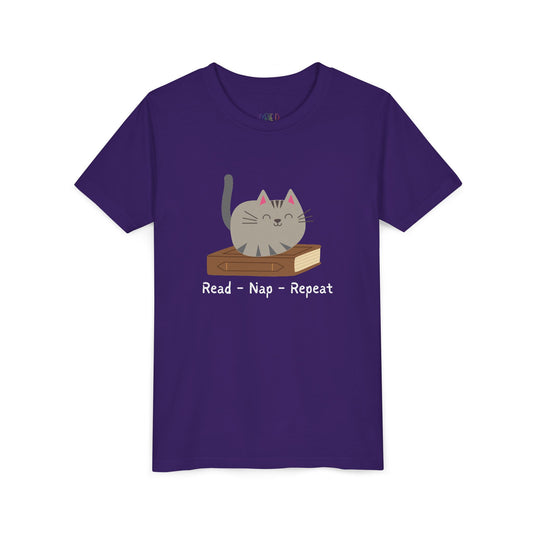 Purple t-shirt with a cat sitting on a book and text 'Read - Nap - Repeat' 