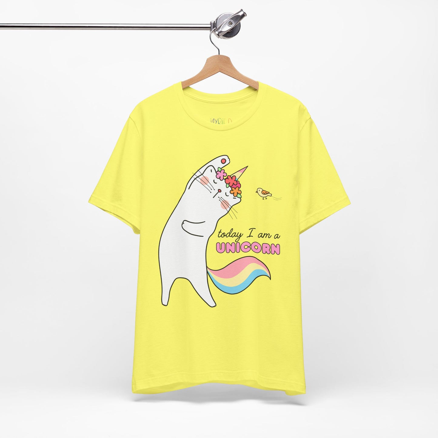 Yellow t-shirt with a cat dressed as a unicorn, doing stretches and text 'Today I Am A Unicorn' 
