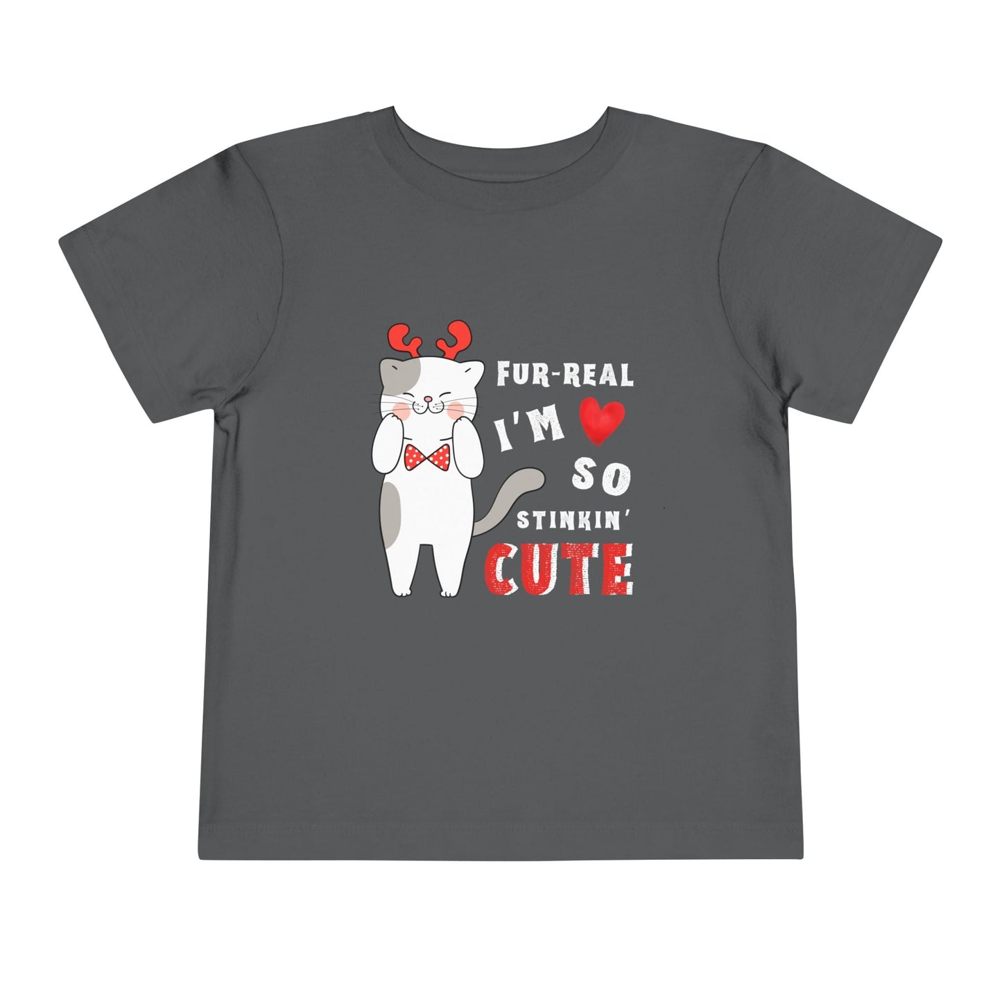 Gray toddler t-shirt with a cartoon cat design in reindeer antlers and bow tie, with text 'FUR-REAL I'M SO STINKIN' CUTE' on a white background