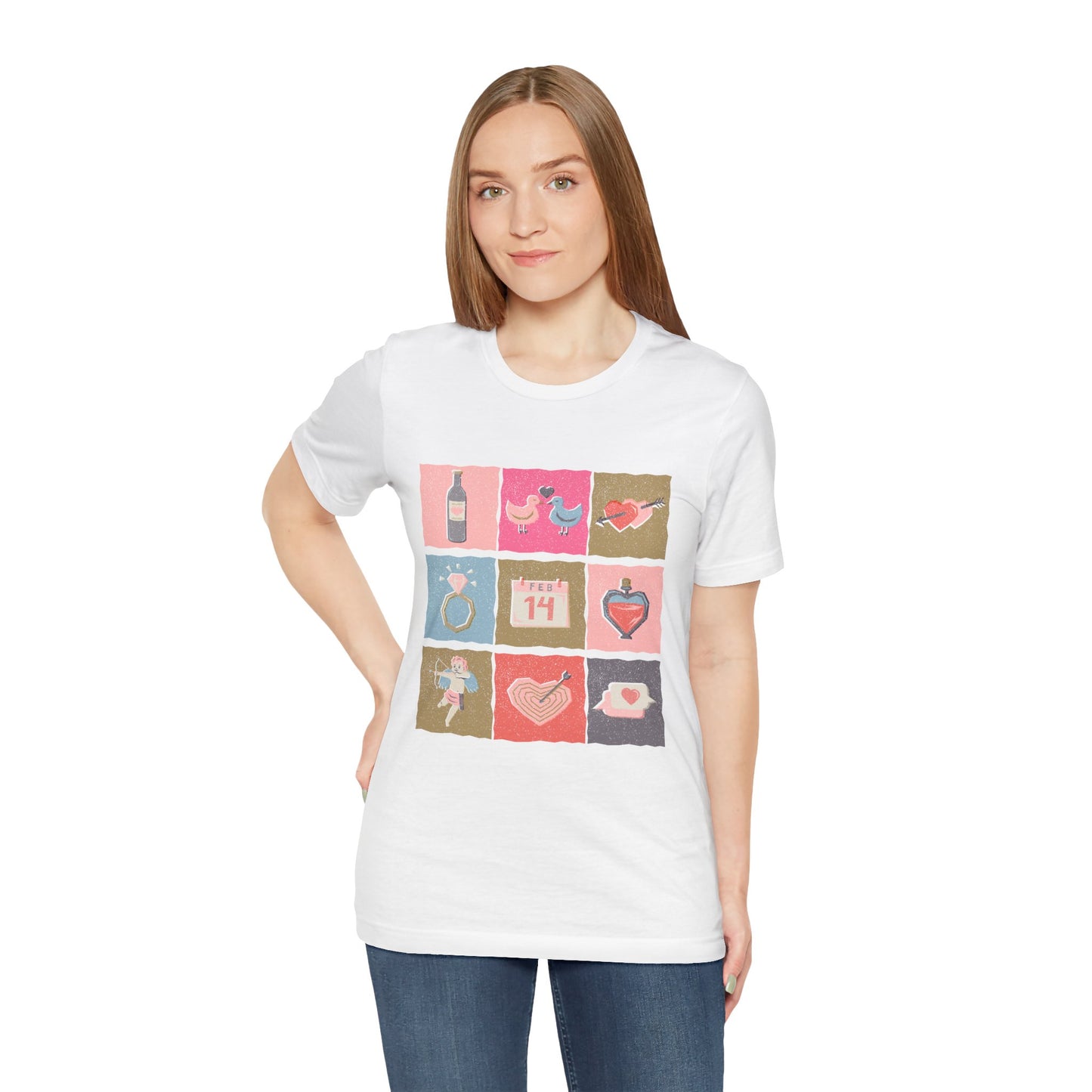 Woman wearing a white t-shirt with colorful graphic design of Valentine's Day images stacked in blocks