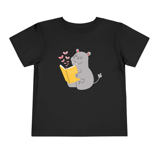 Black t-shirt with a hippo reading a book and butterflies flies off the pages