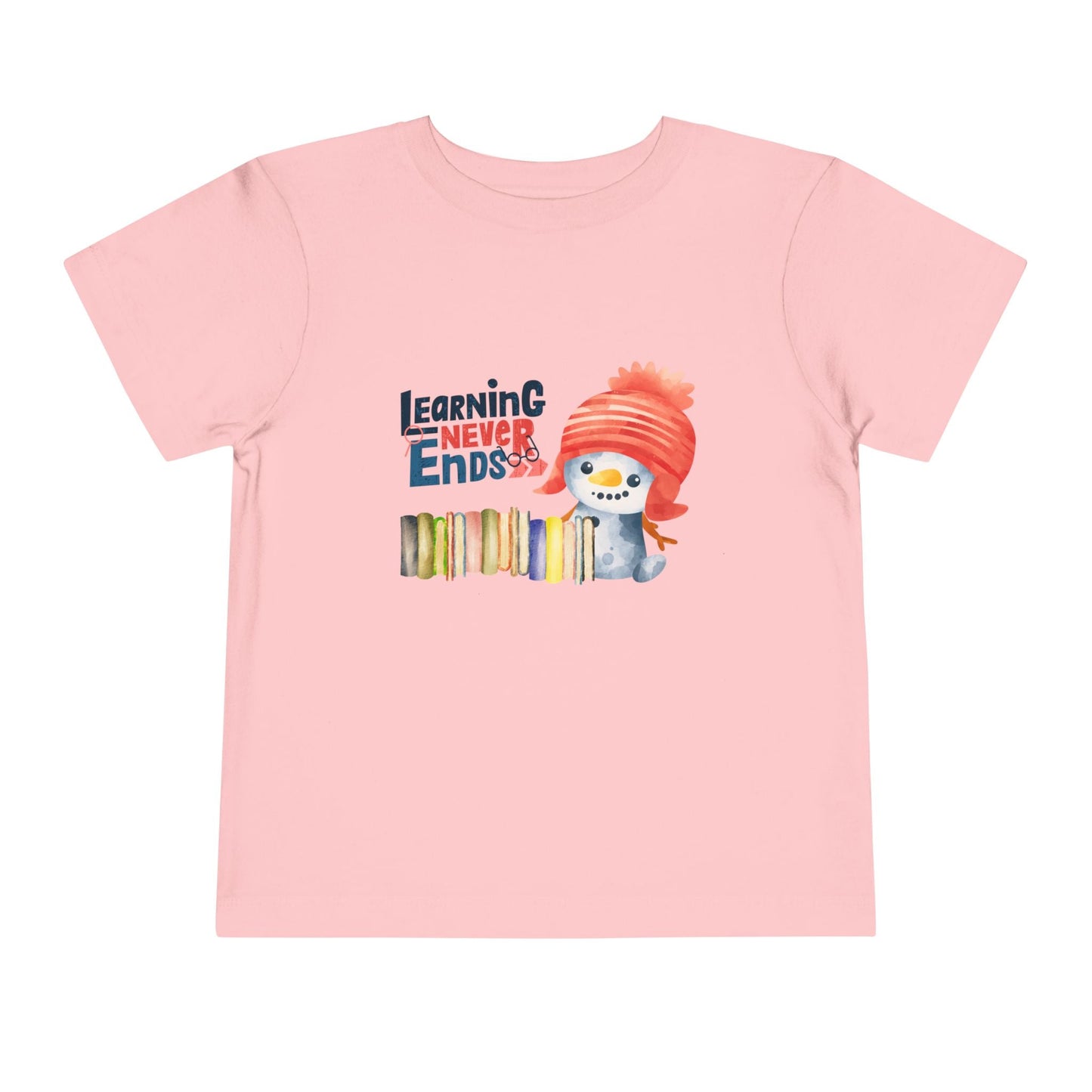 Pink toddler t-shirt with a snowman, a row of books and 'Learning Never Ends' text on a white background