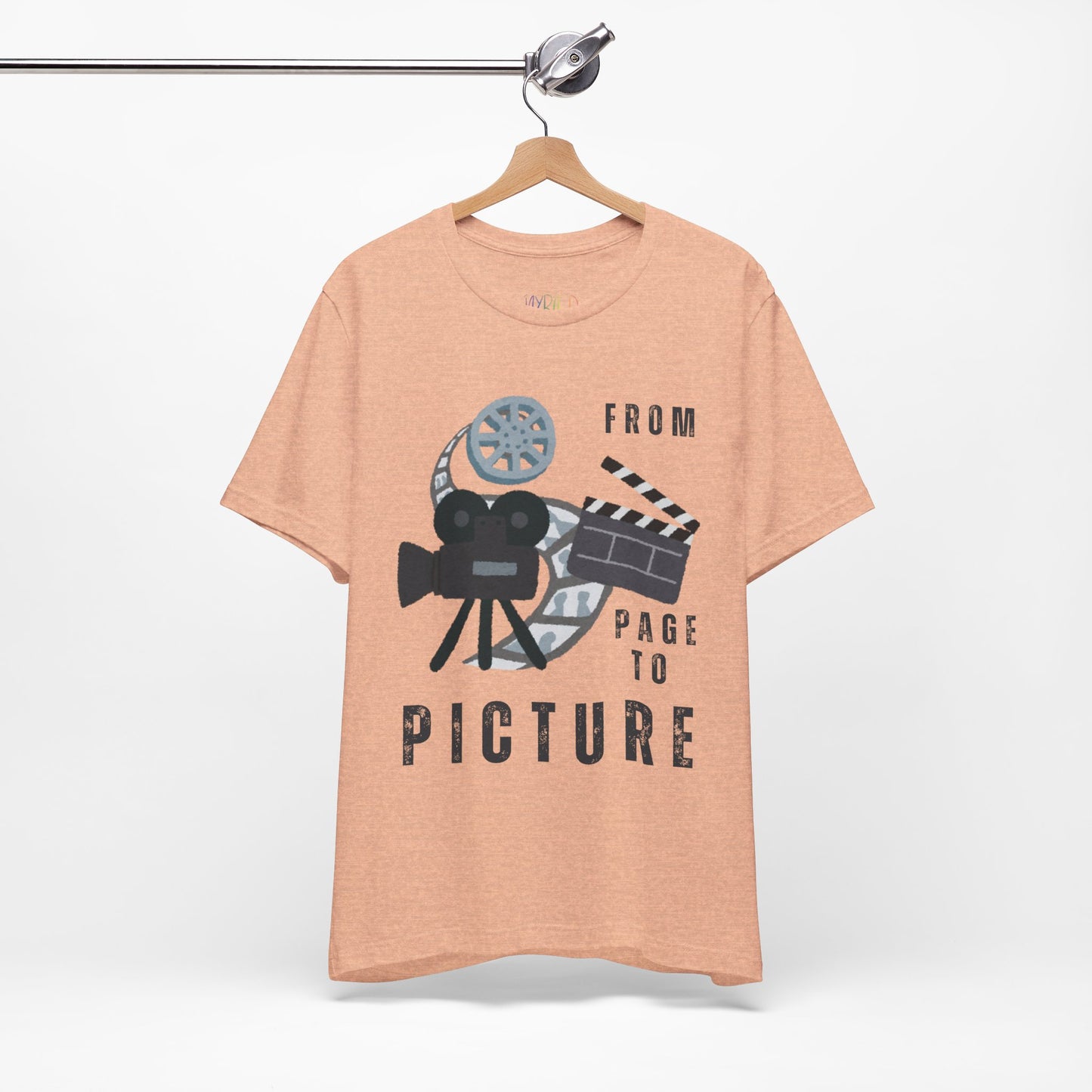 Peach t-shirt with movie-themed graphic and text 'From Page to Picture' 
