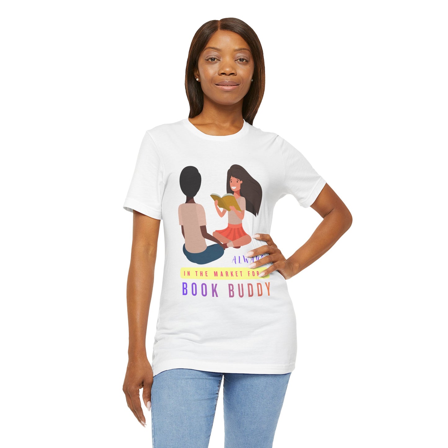 Woman wearing a white t-shirt with graphic of two people reading together and text 'Always in the market for a book buddy' 