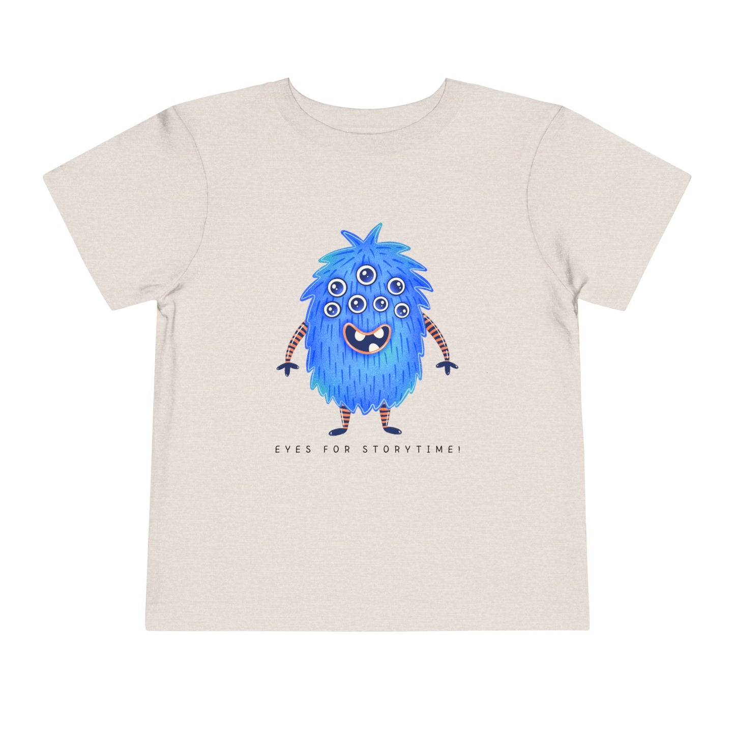 Tan toddler t-shirt with a blue multi-eyed cartoon monster and text 'eyes for storytime!'