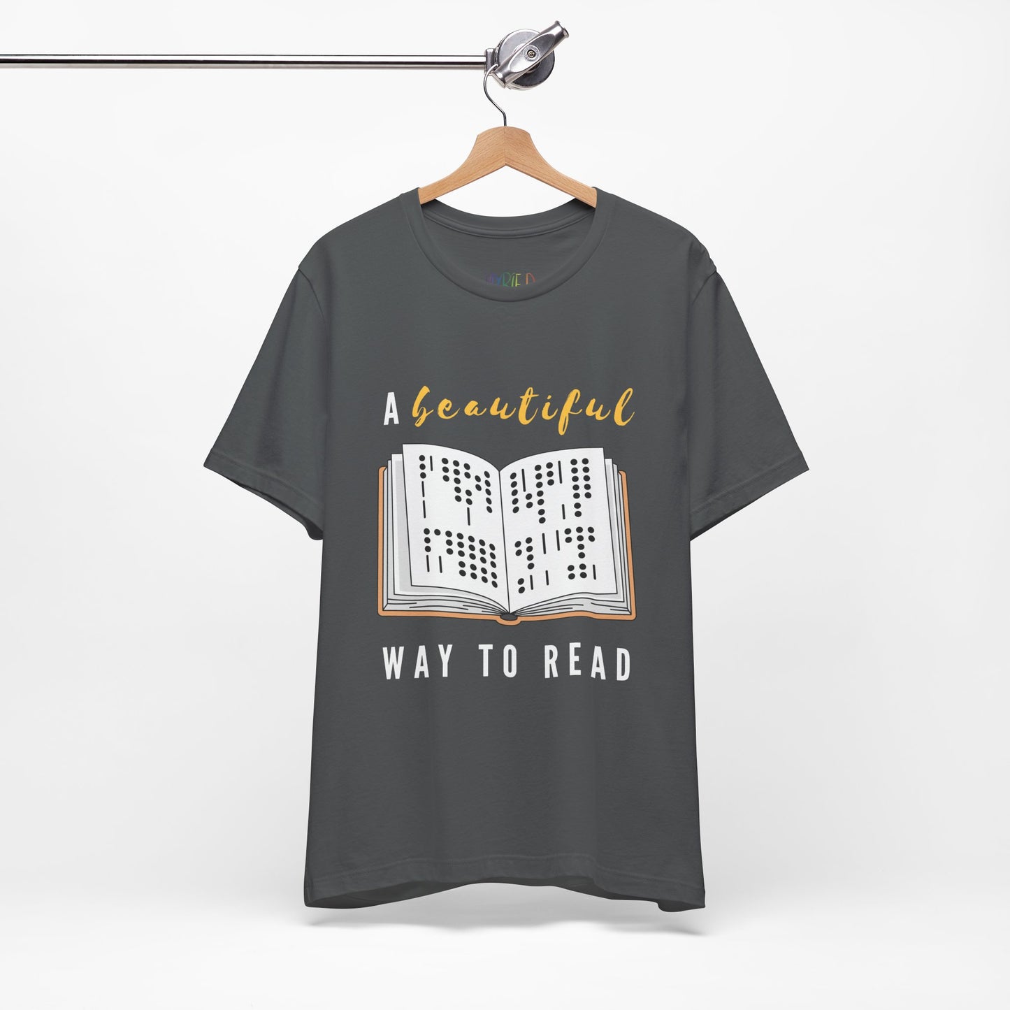 Gray t-shirt with graphic design of a book in braille and text 'A Beautiful Way to Read'