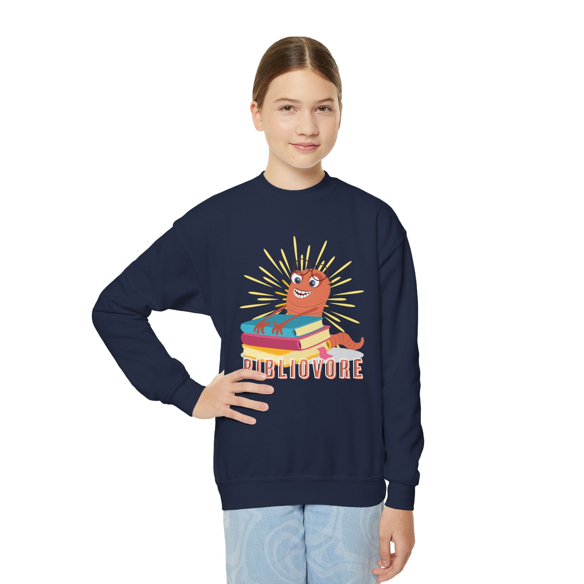 Girl wearing a navy blue sweatshirt with a worm hugging a stack of books and text 'Bibliovore'