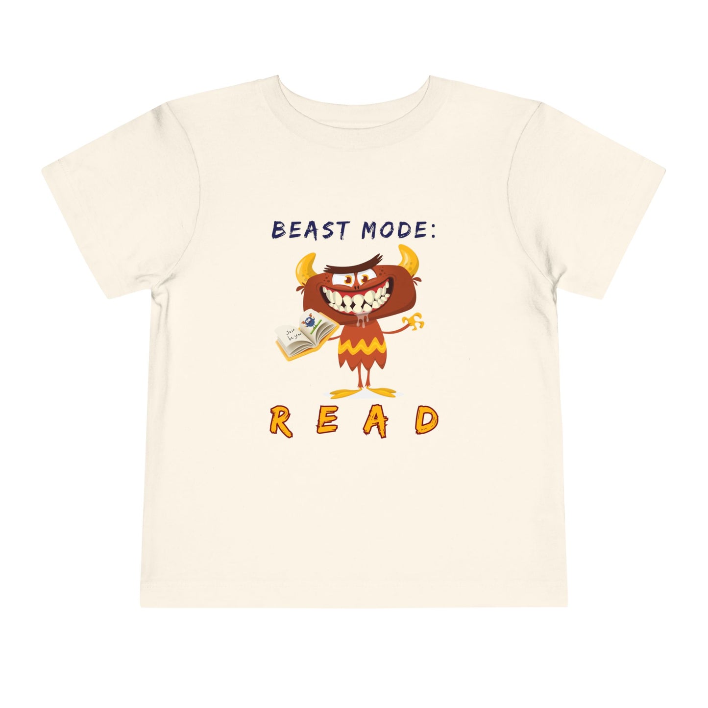 Beige toddler t-shirt with a drooling cartoon monster holding a book and text 'Beast Mode: Read' 