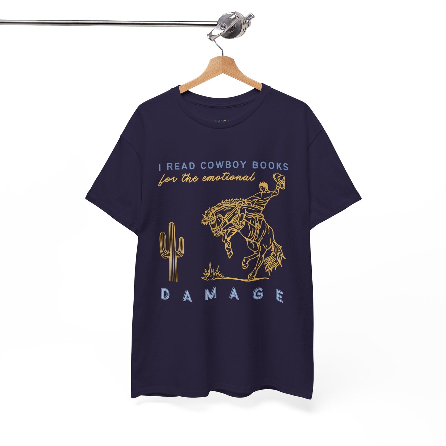 Dark blue t-shirt with gold bucking bronco cowboy graphic and text 'I Read Cowboy Books For The Emotional Damage' 