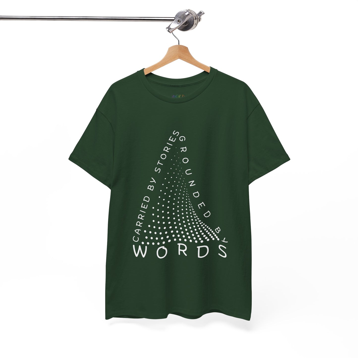 Green t-shirt with white text that follow the outline of a dotted triangle 'Carried By Stories, Grounded By Words' 