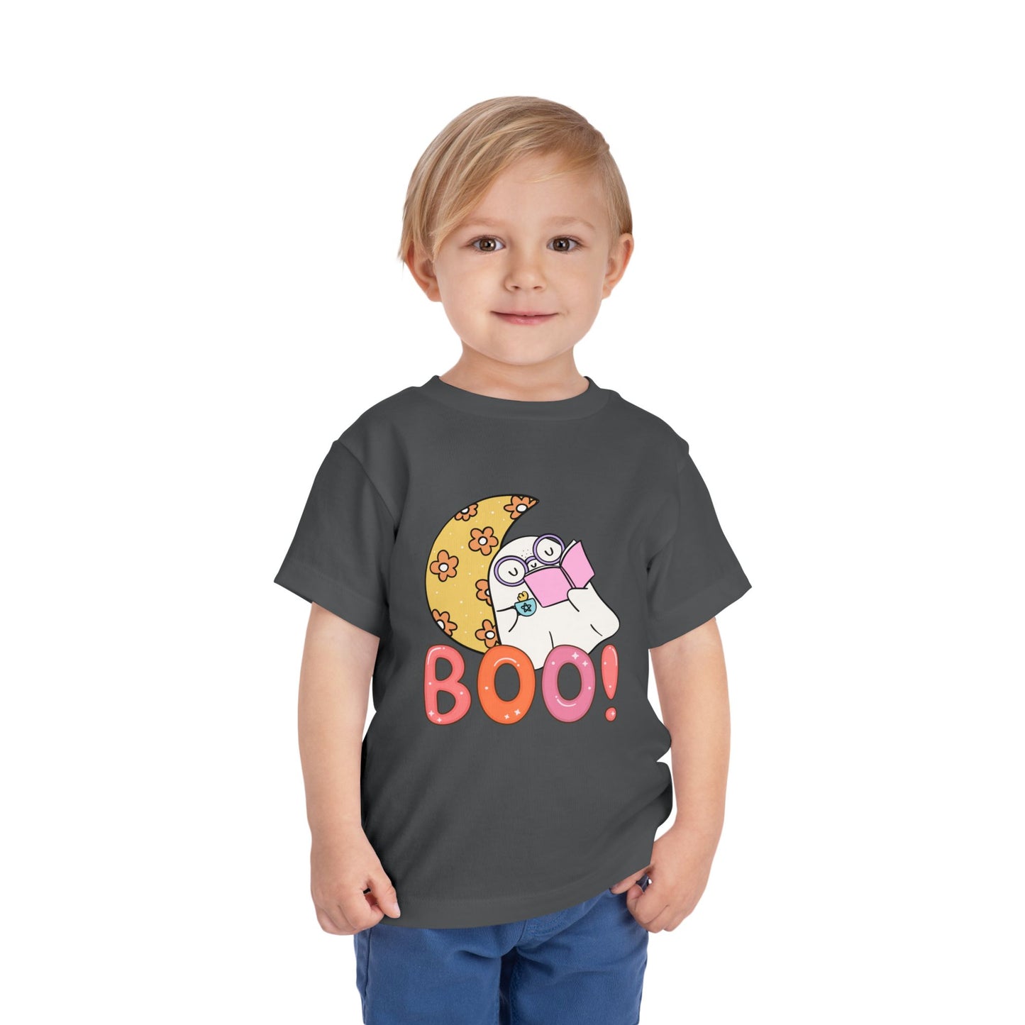 Toddler wearing a gray t-shirt with a Halloween-themed design featuring a ghost, moon, and 'BOO!' text 