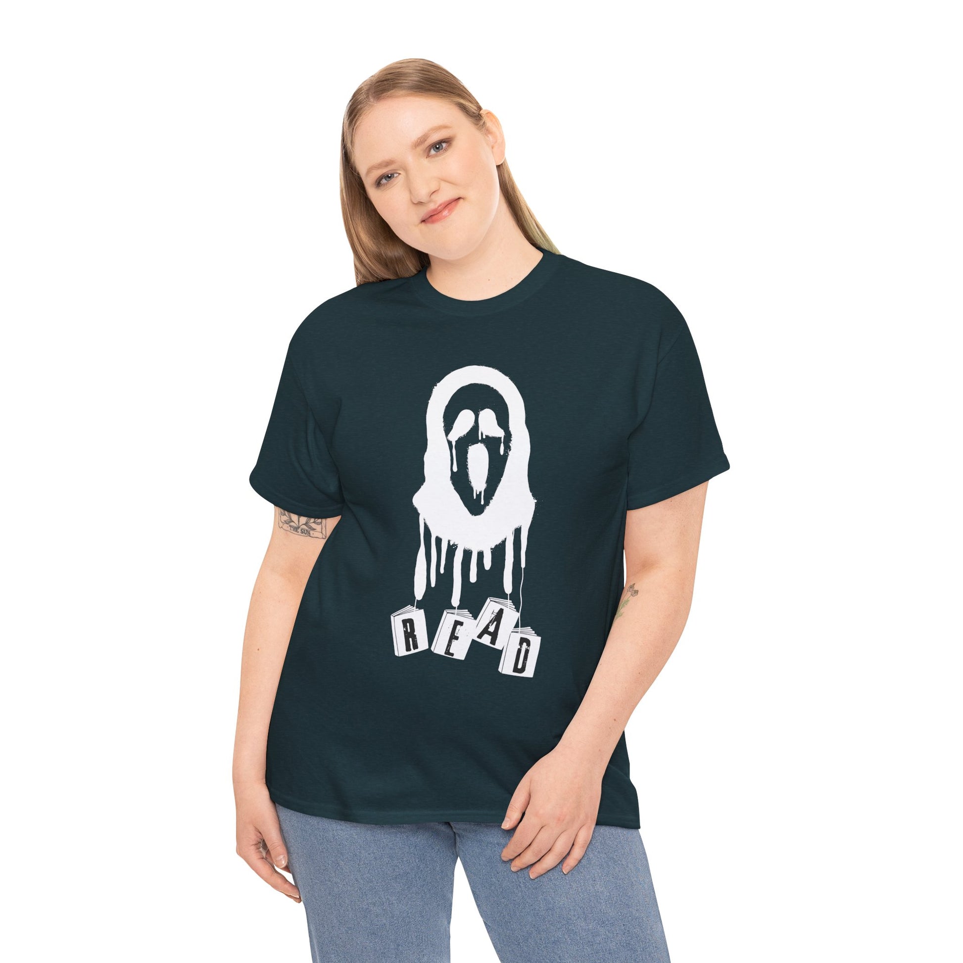 Woman wearing a midnight t-shirt with a white graphic of the scream mask with dangling books that spell out 'READ' on a hanger against a white background