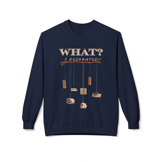 Navy blue sweatshirt with string dangling from a branch, each olding one or more books, and text 'WHAT? I Decorated' 