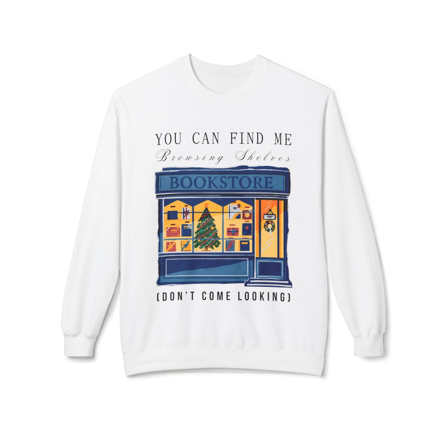 White sweatshirt with a graphic of a bookstore, Christmas tree in the window and text 'You Can Find Me Browsing Shelves (Don't Come Looking)'