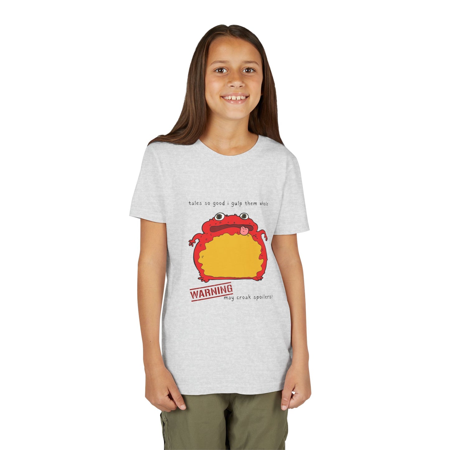 Girl wearing a light gray t-shirt with a toad and text 'tales so good I gulp them whole' and a warning 'may croak spoilers'