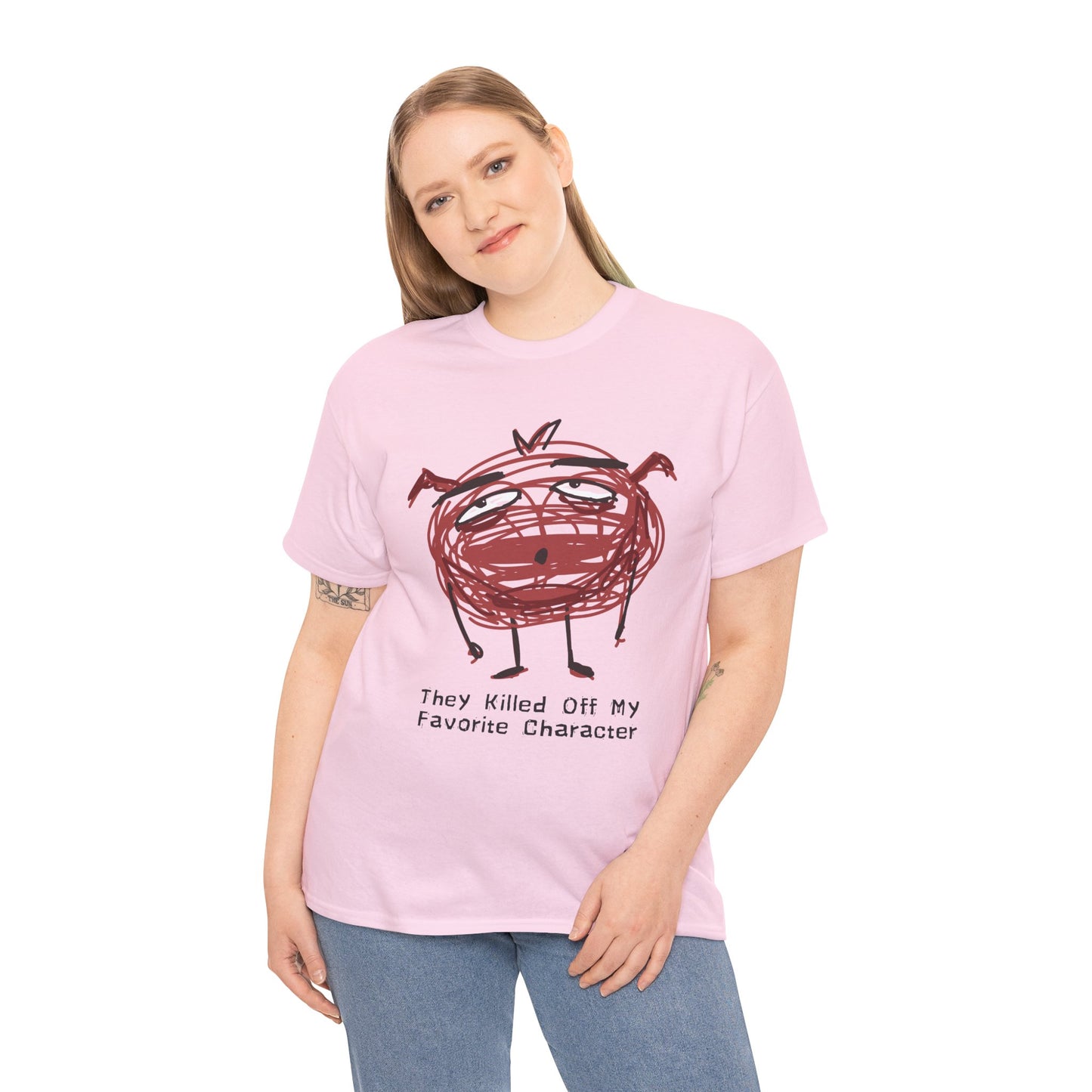 Woman wearing a pink t-shirt with a scribbled character looking defeated and text 'They Killed Off My Favorite Character'