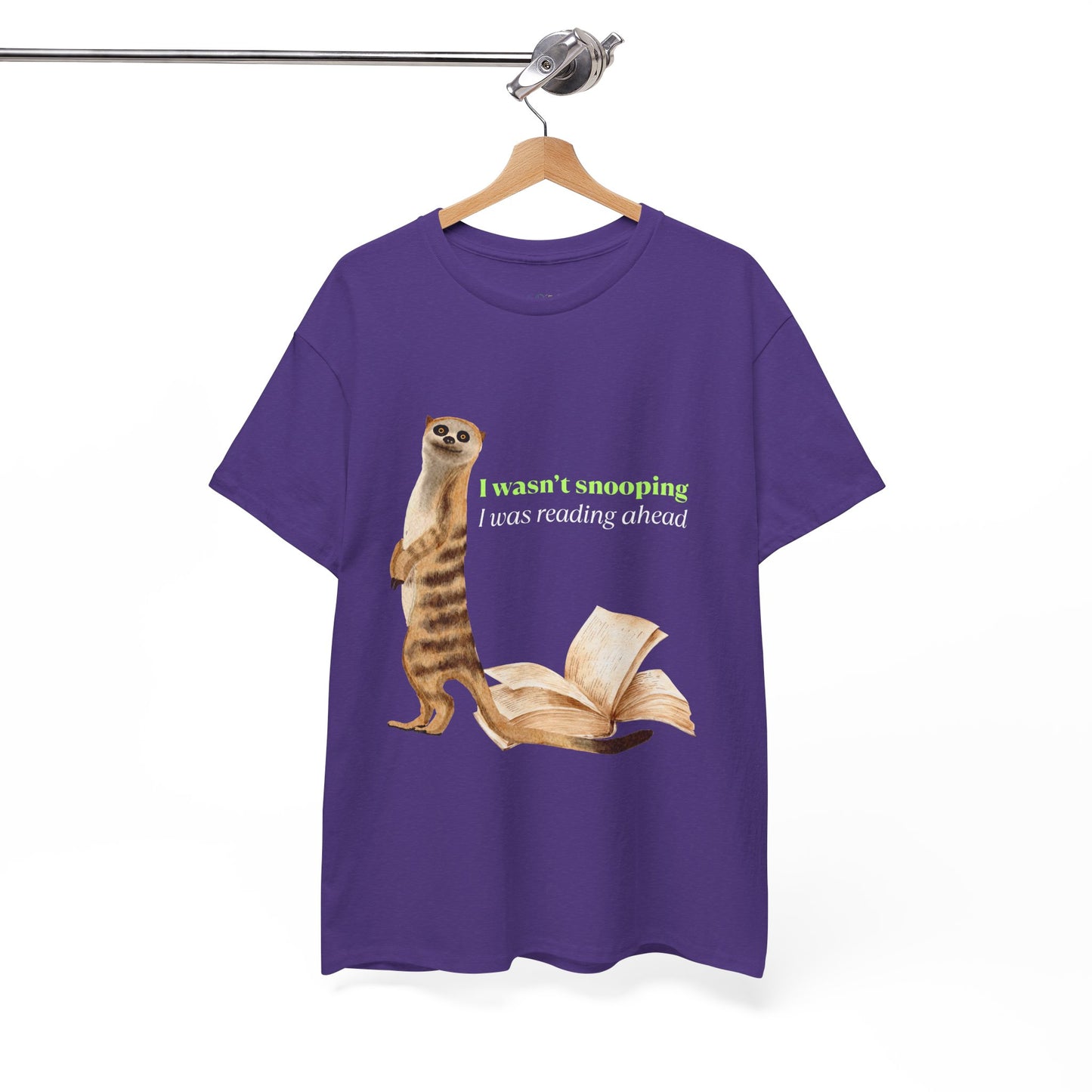 Purple t-shirt with a sheepish meerkat, back to an open book, text 'I Wasn't Snooping, I Was Reading Ahead'