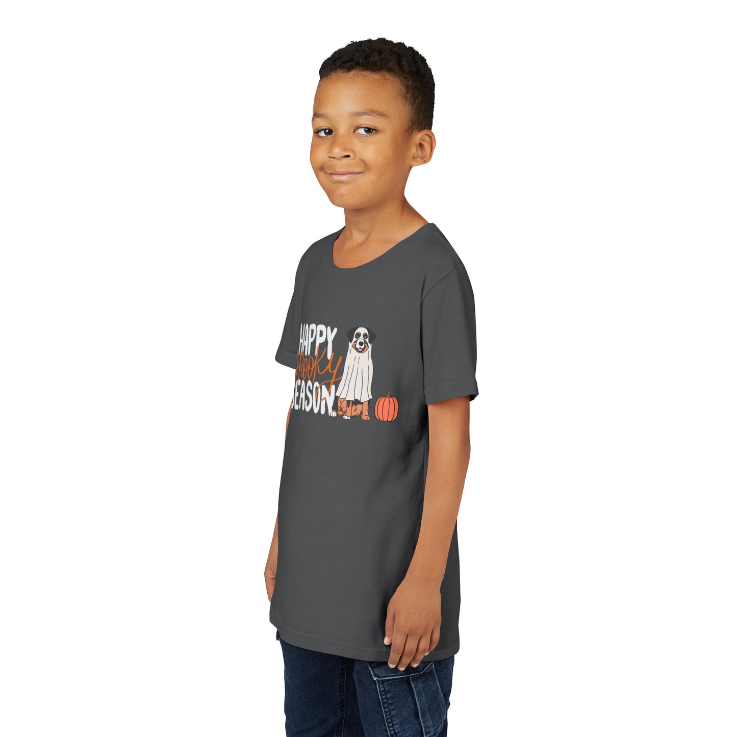 Boy wearing a gray t-shirt with 'Happy Spooky Season' text and a dog dressed as a ghost