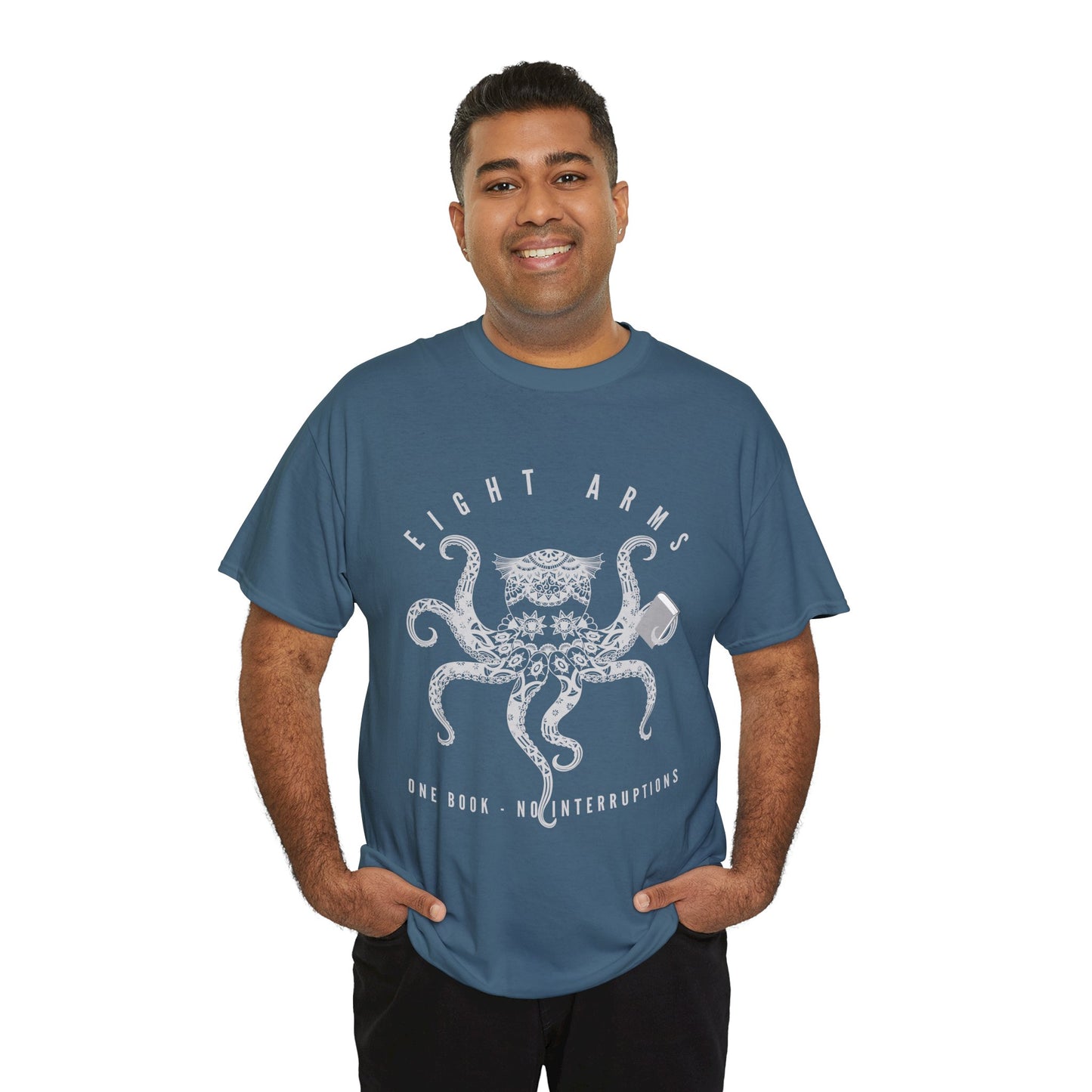 Man wearing a teal t-shirt with an octopus design holding a book and text 'Eight Arms, One Book, No Interruptions'